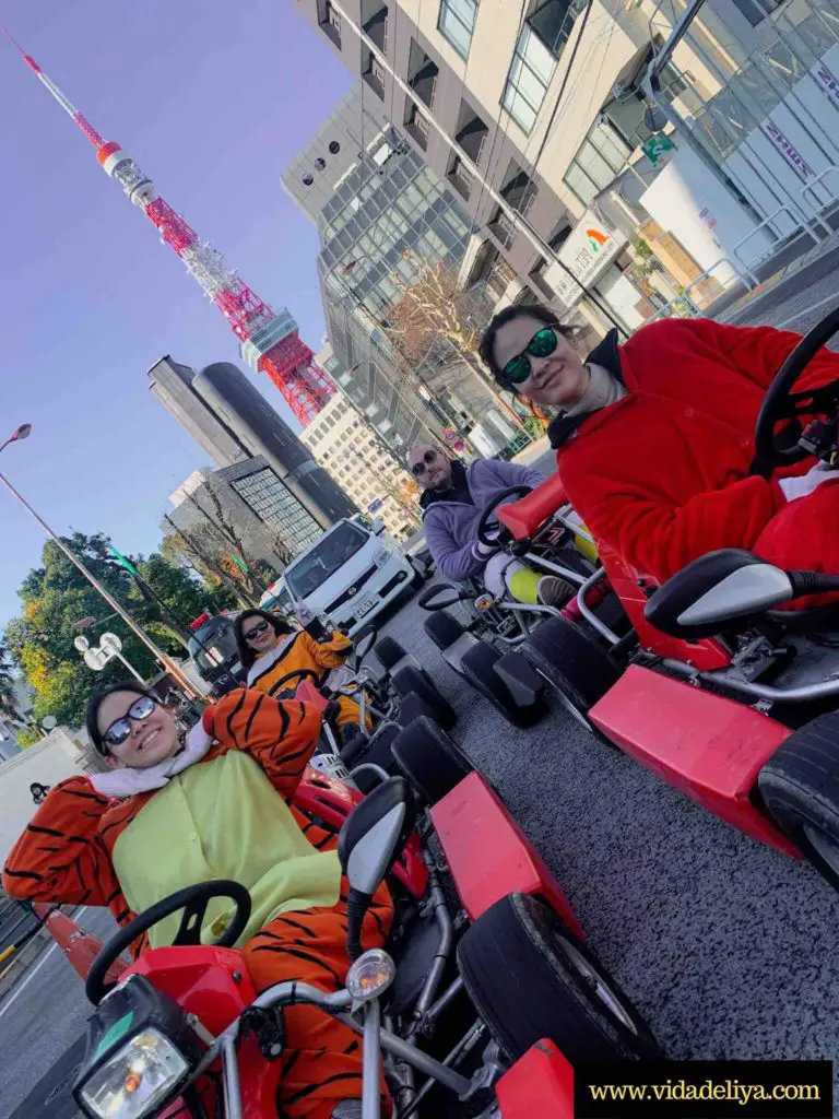 Group Photo of us Mario carting in Tokyo, Japan at base of Tokyo Tower