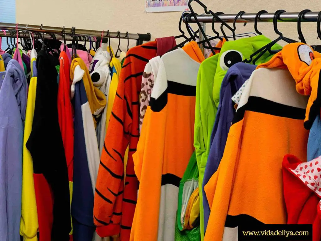Racks of game character costumes to select & wear for the Mario Kart adventure in Tokyo, Japan